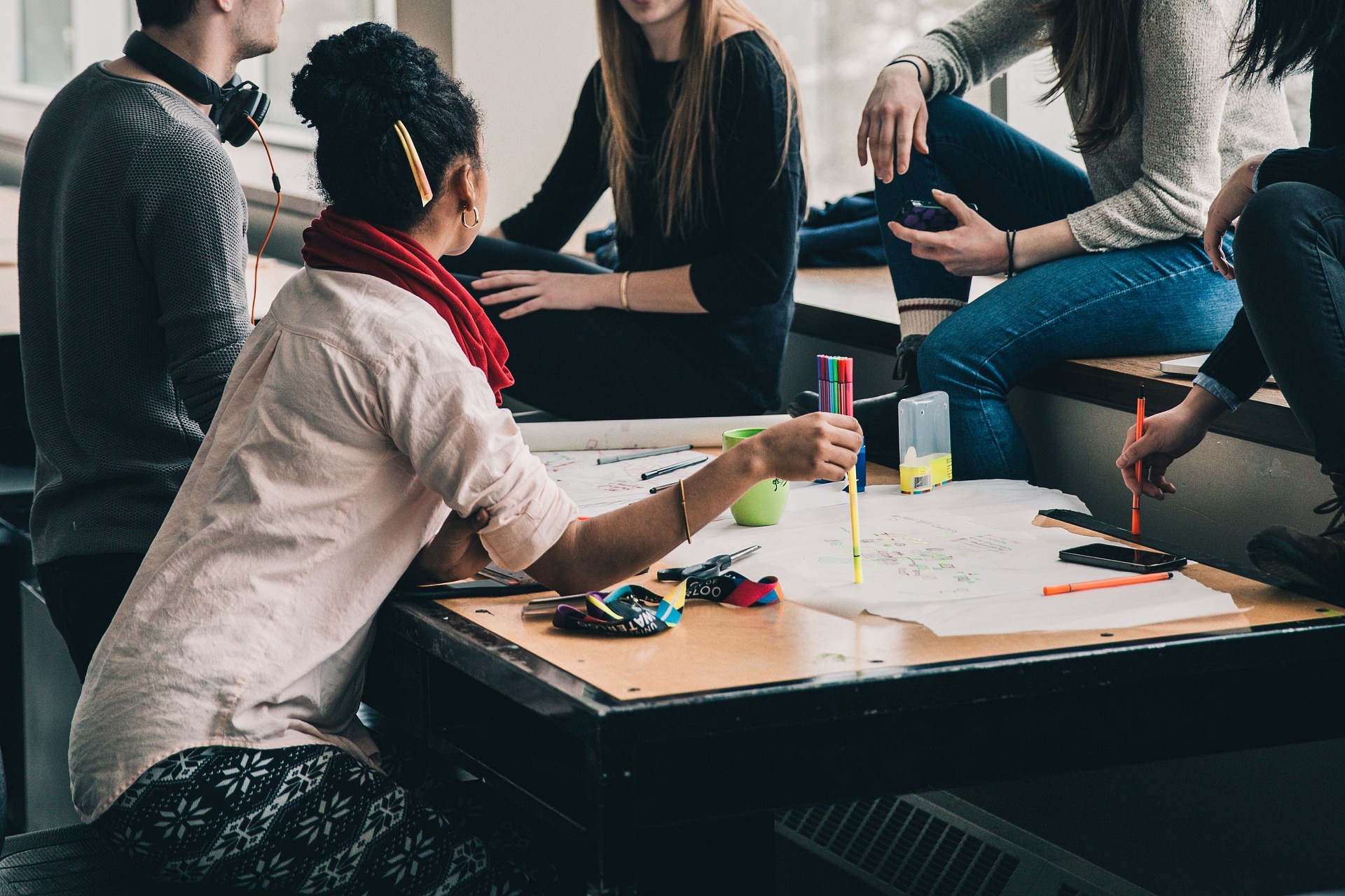 A group of people around a target audience plan