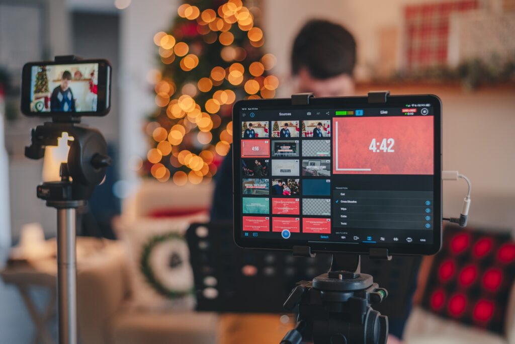 A photo of a group live streaming an event or webinar for guests. 